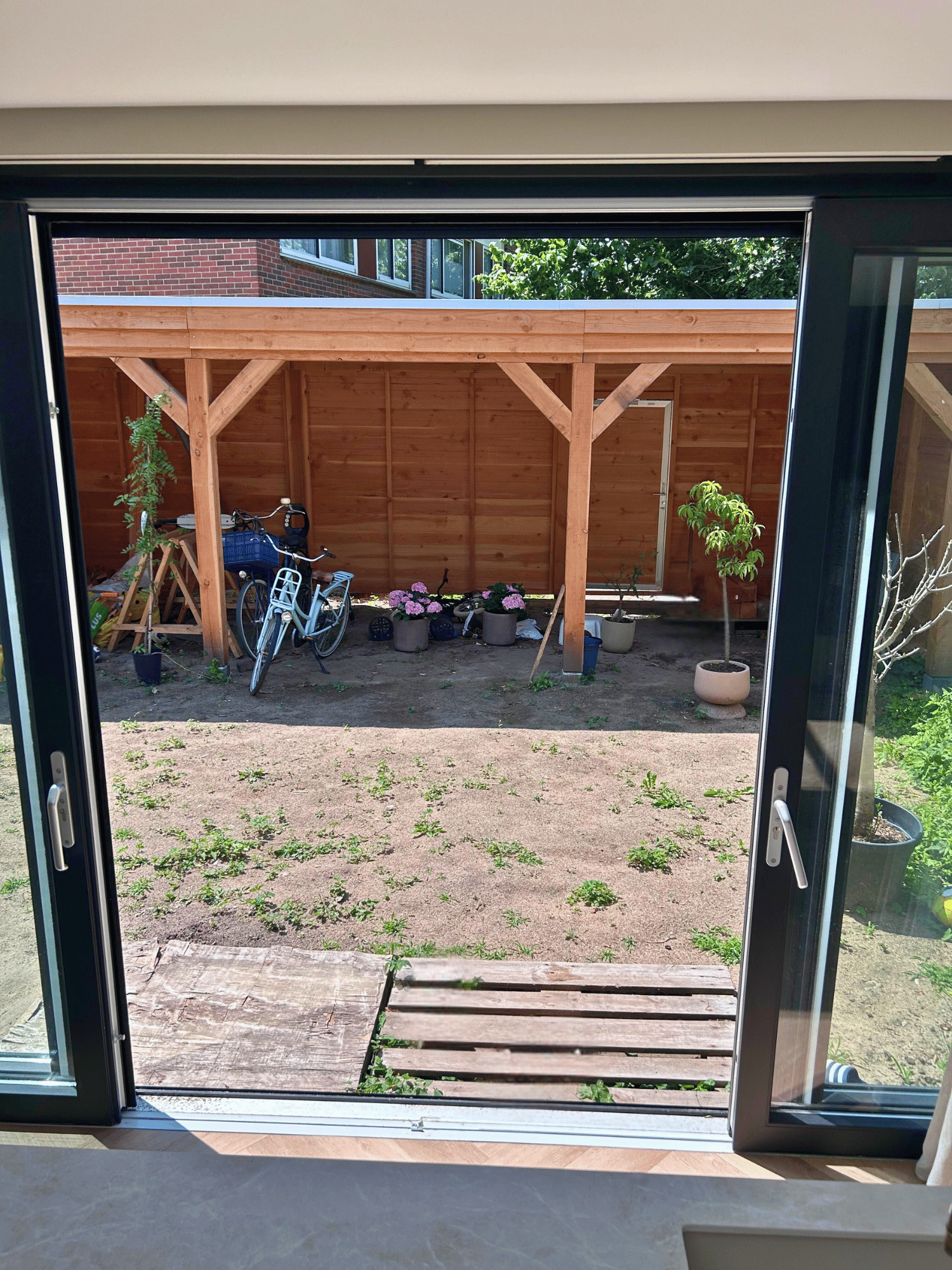 Aluminium schuifpui volledig geopend naar terras